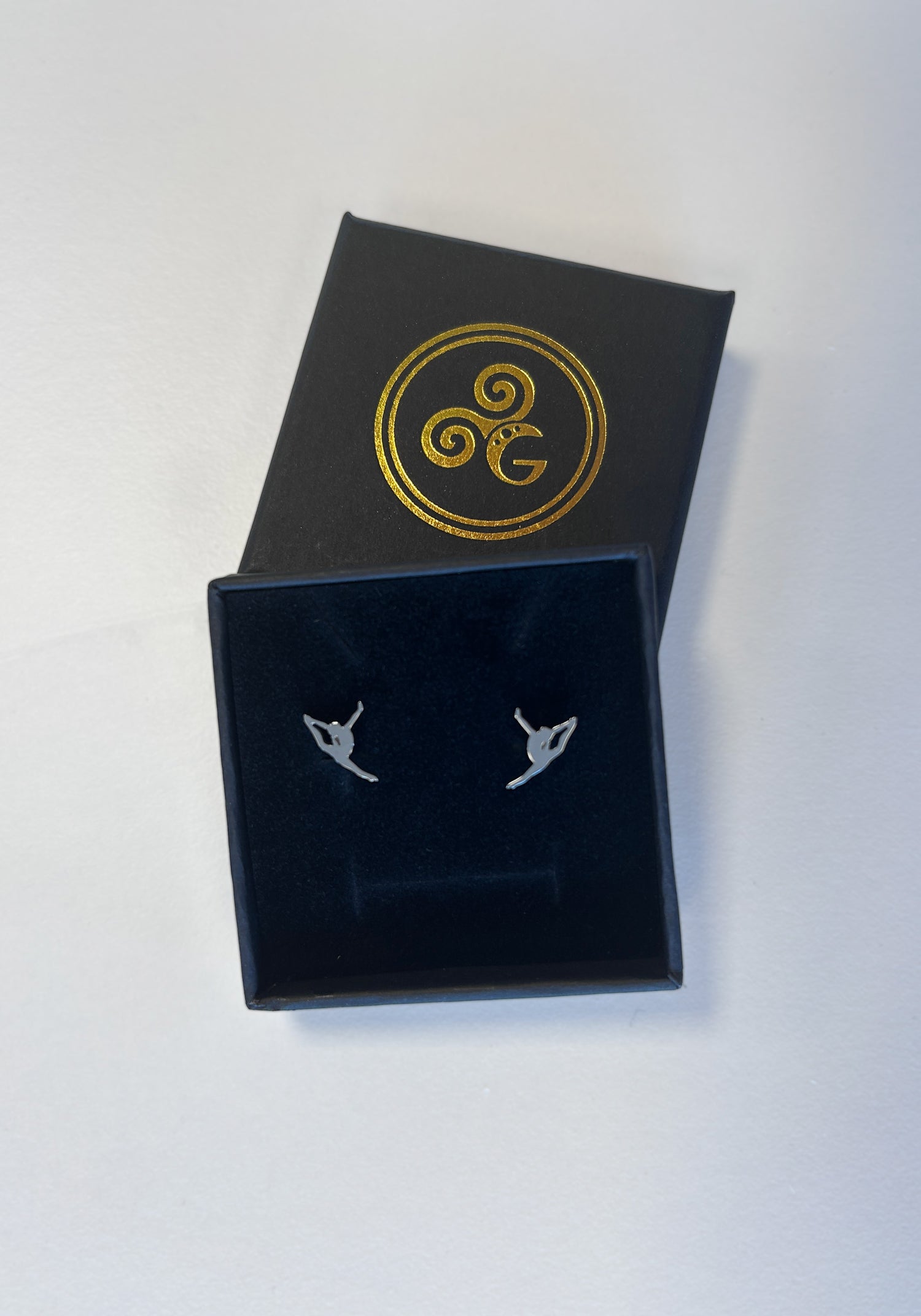 silver gymnast earrings